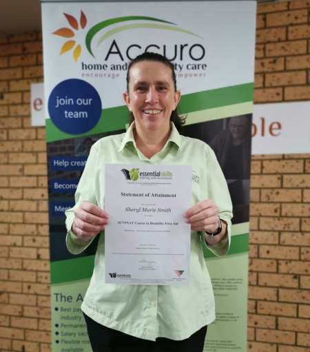 Operations Manager holding a certificate